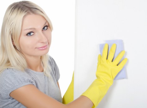 Technician performing mattress cleaning in Surbiton home